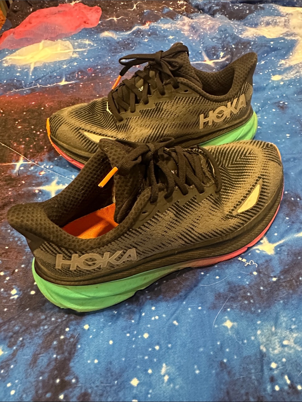 Hoka Black Clifton 9 Running Shoes with bright pink green soles